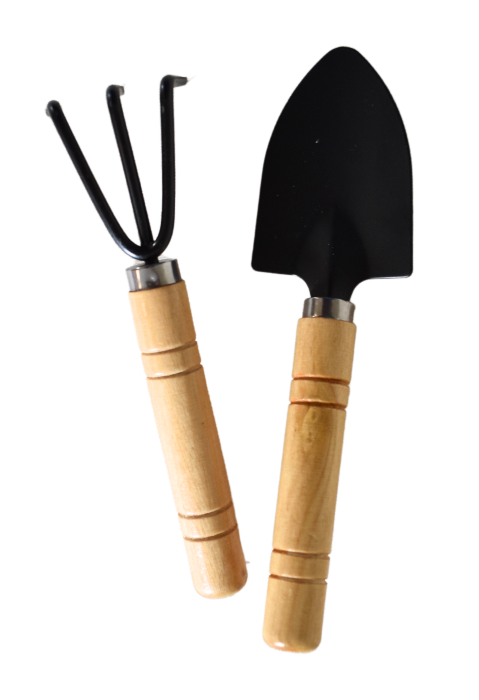 Ein kleines Gartenwerkzeug-Set bestehend aus einer schwarzen Handschaufel und einer kleinen dreizinkigen Harke mit Holzgriffen, nebeneinander liegend.